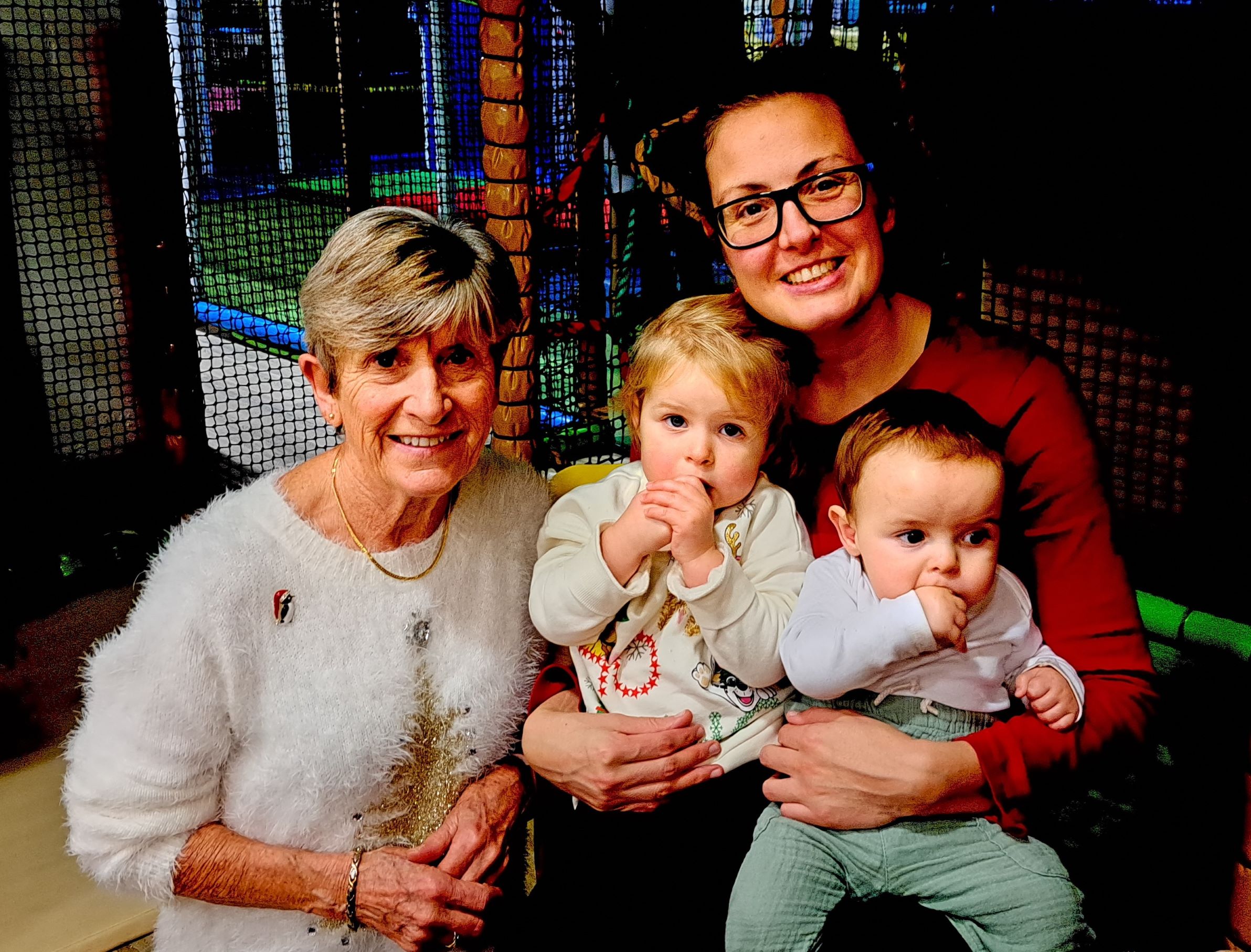 Image of mother, child and volunteer